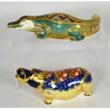 A Royal Crown Derby Imari paperweight of an alligator with silver stopper and another hippopotamus