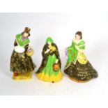 Three Tuscan figures; Lady Grace, Sweet Hortense, Squire's Daughter each potted by plant and with