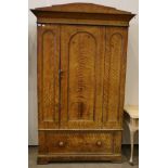 A Victorian Scumbled Pine Single Door Wardrobe, circa 1870, with an architectural pediment above