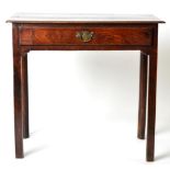 An 18th Century Joined Oak Side Table, with single frieze drawer and raised on chamfered legs,