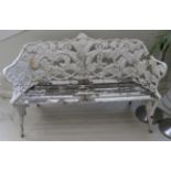 A Coalbrookdale Style White Painted Cast Iron Garden Bench, the back cast with ferns over a wooden