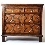 A 17th Century Oak Geometric Moulded Three Drawer Straight Front Chest of Drawers, raised on stile