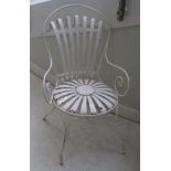 Francois A Carre: A Steel Sprung Garden Armchair, with wrought frameRecently repainted, six slats to