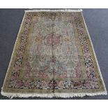 Kashmir Silk Rug North West India, circa 1930 The ivory field of stylised plants around a