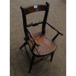 A Child's Beech and Elm Windsor Commode Armchair, late 19th century, with spindle arm supports above