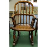 A 19th Century Ash and Elm Child's Windsor Rocking Chair, with double spindle back support and