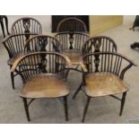 A Matched Set of Four Mid 19th Century Yew and Elm Windsor Armchairs, with double spindle back