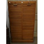 A 1920/30s Oak Double Fronted Tambour Office Cabinet, the interior with an arrangement of drawers