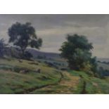 Ernest Higgins Rigg (British 1868-1947) Sheep grazing in an extensive landscape Signed, oil on