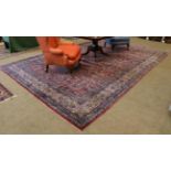 Indian Carpet, circa 1910 The raspberry field with an allover one way design of serrated scrolling