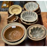 A Brown Saltglaze Stoneware Jelly Mould, 19th century, modelled with a pineapple, 9cm; A Similar