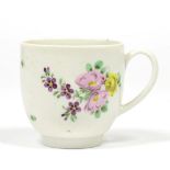 A Champions Bristol Porcelain Coffee Cup, circa 1775, painted in colours with flowersprays and