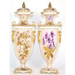 A Pair of Royal Crown Derby Porcelain Urn Shaped Vases and Covers, circa 1890, with loop and husk