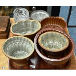 A Tinned Copper Jelly Mould, 19th century, of fluted ovoid form, 13.5cm; A Brown Saltglaze Stoneware