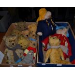 Two modern Paddington Bears in duffel coats, hats and wellies; and assorted jointed yellow teddy