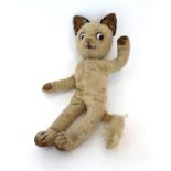 Schuco 'Koko' Cat, from the Bigo-Bello Series, cream mohair body, brown velvet ears and paw pads,