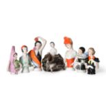 Six Large China Half Dolls, primarily in the 1920/30s style; and a Seated China Half Doll Pin