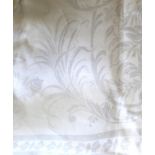 A White Damask Banqueting Cloth, woven with floral designs, 460cm by 15ft by 215cm approx