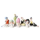 Three Miniature China Stylised Busts, modelled in the 'flapper' style with bobbed haircuts and