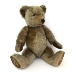 Circa 1940/50s Chiltern Hugmee Teddy Bear, with black stitched nose, glass eyes, velvet pads,