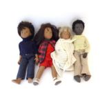 Sasha Gregor Doll, in denim jeans with blue polo neck jumper; Sasha Brunette Doll, in red cotton