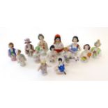 Twelve Assorted China Half Dolls, primarily in the 'flapper' style in a variety of poses; and a