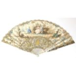 Pastoral Scene: An 18th Century Mother-of-Pearl Fan, with carved, pierced and gilded sticks. The