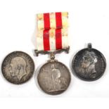 An Indian Mutiny Medal, 1857-1858, name erased, no clasp; a Copy of a Waterloo Medal; a British