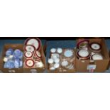 Four boxes of various dinnerwares including Old Willow pattern, Meakin, Wedgwood etc