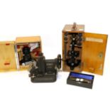 Watson Microscope with three lens turret, black lacquered, in original case; together with a