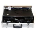 Sharp MD/CD Deck MD-R30 triple CD player in hard case, together with a Yamaha PSR 630 electronic