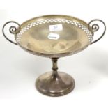 A twin handled silver pedestal dish or comport, Martin Hall & Co, Sheffield 1918, with pierced