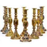~ Five pairs of brass candlesticks