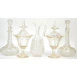 ~ A pair of glass confitures, a pair of engraved decanters and a cut glass jug (5)