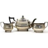 ~ Three piece silver tea set, 34.8ozt gross