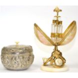 ~ An Indian silver bowl and cover, with an insert; and a French mother of pearl shell perfume