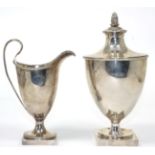 ~ A George III silver urn and cover by John Robins 1783, together with a George III silver helmet