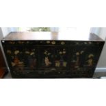 A Chinese Lacquered and Polychrome Decorated Low Sideboard, richly painted with flowers and vases,