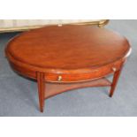 A Multiyork Mahogany and Crossbanded Coffee Table, modern, of oval form with two drawers, raised