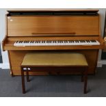 A Challen Light Walnut Cased Upright Overstrung Piano, modern, 145cm wide; and An Eavestaff Teak