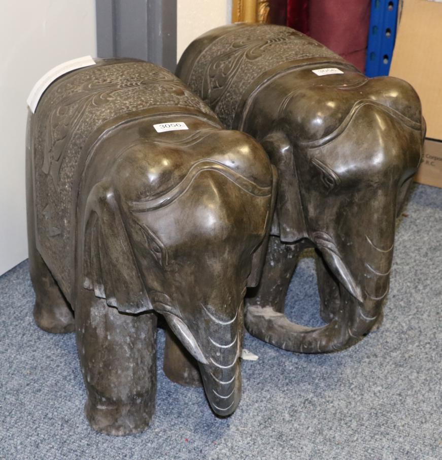 A Pair of Indian Carved Stone Figures of Elephants, modern, standing on four square from legs with