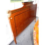 An Egyptian Revival Burr Maple, Ebony and Gilt Metal Mounted Headboard, modern, with a moulded top