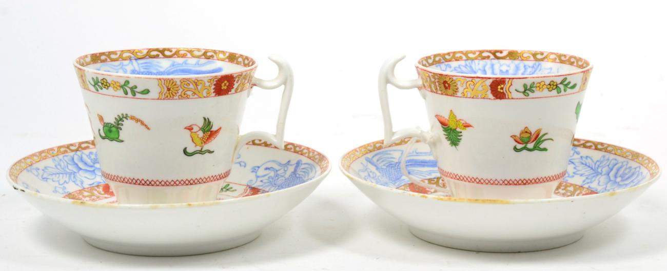 A pair of Spode tea cups and saucers, 19th century