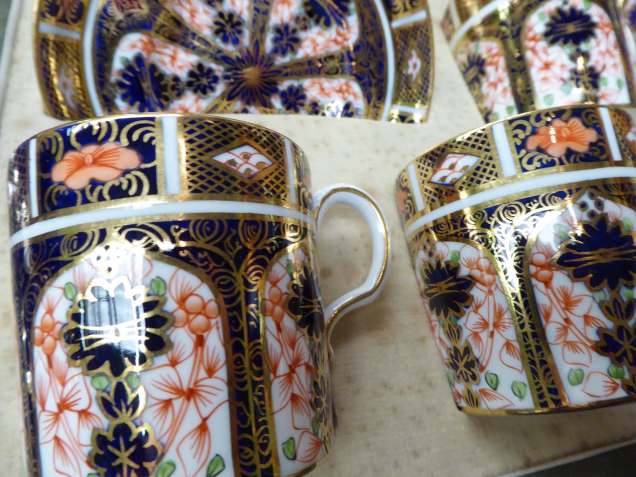 A cased set of six Royal Crown Derby Imari palette coffee cans and saucers; together with a set of - Image 4 of 6