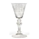 An Armorial Alliance Wine Glass, engraved in the manner of Willem Otto Robart, circa 1740, the