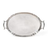 A Twin-Handled Silver Tray, Roberts & Belk, Sheffield 1927, oval with shaped rim, 52cm wide over