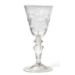 An Armorial Wine Glass, engraved by Willem Otto Robart, circa 1740, the rounded funnel bowl engraved