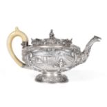 A George IV Chinoiserie Silver Teapot, Joseph Angell, London 1824, circular on domed pedestal
