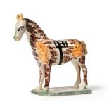 A Pratt Type Figure of a Horse, possibly Newcastle, circa 1810, standing four square with brown