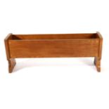 Mouseman: A Robert Thompson English Oak Planter, of rectangular form with shaped end supports,